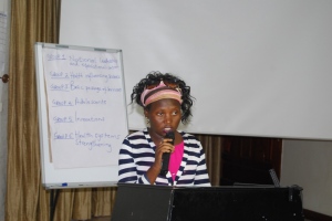 CFYDDI Behavior Change and Communication Advocacy Manager Ms. Prossy Babirye delivers Her remarks
